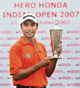 Jyoti Randhawa holds the trophy after winning the Indian Open at the Delhi Golf Club on Sunday.