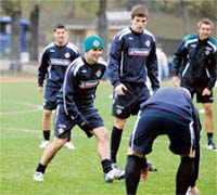 Northern Ireland's David Healy (with green hat) takes part in a soccer training session at Kristinebergs arena in Stockholm on Monday. Northern Ireland will play a Euro 2008 qualifier against Sweden in Stockholm on Wednesday. �