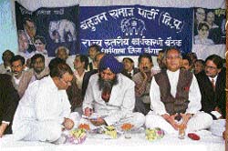 BSP general secretary Man Singh Manhera and state BSP convener Vijay Singh Mankotia sitting on the dais during a state-level BSP executive committee meeting at Dharamsala on Thursday