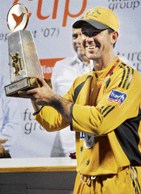Australian captain Ricky Ponting holds the Future Cup trophy in Mumbai on Wednesday after beating India 4-2 in the seven-match ODI series
