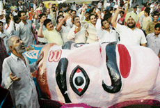 Congress workers protest outside the venue of Dussehra celebrations after they were not allowed to carry the effigy of Ravana by BJP workers