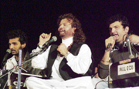 Hans Raj Hans performs with sons Navraj and Yugraj at the conclusion of the 6th Baba Jassa Singh Kapurthala Heritage festival in Kapurthala on Saturday night