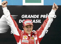 Kimi Raikkonen celebrates after winning the Formula One crown at the Interlagos racetrack in Sao Paulo on Sunday.