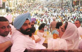 MLA Kewal Singh Dhillon and PPCC president Rajinder Kaur Bhattal at a rally organised in Barnala