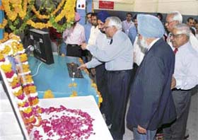 Mr R.P. Bambah has a question to ask before switching on the printing press at the launch of the Bathinda edition of The Tribune in Bathinda