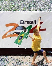 A child celebrates after FIFA announced that Brazil will be the host of the 2014 World Cup in downtown Sao Paulo on Tuesday.