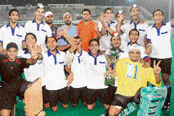 Members of the Surjit Hockey Academy rejoice after winning the junior title of the 24th Indian Oil Surjit Hockey Tournament in Jalandhar