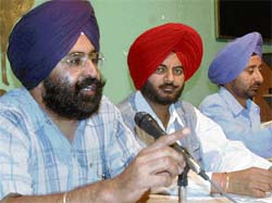 General secretary of the Panchayati Raj Junior Engineers Association Kulwant Singh addresses a press conference at Chandigarh Press Club in Sector 27 on Monday.