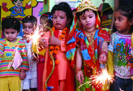 Children celebrate Diwali in Bathinda on Thursday.