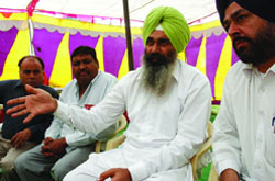 Divisional secretary of NRMU C.S. Bajwa (second from right) and others talking to media in Bathinda