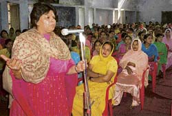 Secretary of a Delhi-based NGO Nandita Bakshi addresses members of self-help groups at Kahnuwan village, near Gurdaspur, on Friday.