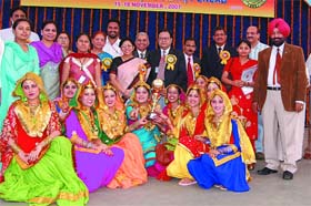 A gidha team receiving the prize from Dr S. M. Kant, Director, PU Youth Welfare Department, in the PU Inter Zonal Youth Festival at Abohar