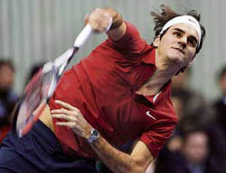 Roger Federer of Switzerland serves during an invitational exhibition tennis match against Pete Sampras of the U.S. in Seoul on Tuesday. Federer won the match.
