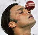 Pakistan's fast bowler Shoaib Akhtar balances a ball during a training session in New Delhi on Tuesday.