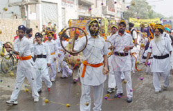 �Gatka� being performed during the procession held on the eve of Gurpurab in Bathinda