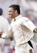 Fast bowler Shoaib Akhtar celebrates after dismissing Wasim Jaffer during the second day of the first Test at the Ferozeshah Kotla ground in New Delhi on Friday.