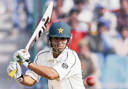 Pakistan�s Salman Butt plays a shot on the third day of the Delhi Test. 