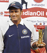 India's captain Anil Kumble poses with his man-of-the-match trophy in New Delhi on Monday.
