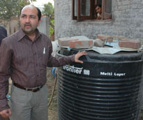 Rajesh Khanna shows his project which produces methane from kitchen waste.