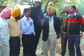 Principal secretary, sports and youth services, R.P.S. Pawar (centre) inspecting the proposed cricket stadium at Bathinda on Tuesday.