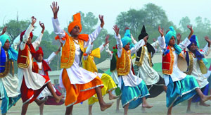 Students perform bhangra on the occasion.