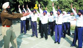 DSP (Traffic) Parminder Pal Singh (left) conducting a traffic camp at Rose Garden