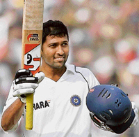 Wasim Jaffar acknowledges the crowd upon completing his century during the first day of the second Test match at the Eden Gardens in Kolkata on Friday.