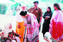Savita Sharma, wife of Brigadier NP Sharma interacting with Gurdial Kaur, wife of late Subedar Joginder Singh who was awarded Param Vir Chakra for his valour in the 1961 Indo-China war