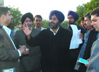 SAD working president Sukhbir Singh Badal giving instructions to officials at village Jodhpur Romana in Bathinda on Wednesday.