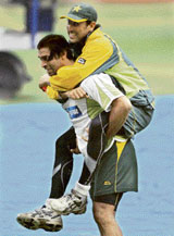 Pakistan�s Shoaib Akhtar carries stand-in captain Younis Khan during a practice session at the Chinnaswamy Stadium in Bangalore on Friday ahead of the third Test.