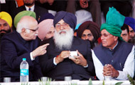 Chief Minister Parkash Singh Badal (centre), BJP leader L.K. Advani and former chief minister of Haryana Om Prakash Chautala, discuss a point during the Badal�s birthday celebration function in Bathinda