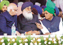 Chief Minister Parkash Singh Badal, BJP leader L.K. Advani and former Haryana Chief Minister Om Prakash Chautala at the birthday celebrations function of Badal at Bathinda 