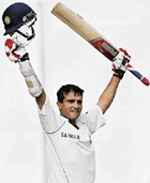 Sourav Ganguly raises his bat after completing his maiden double hundred during the second day of the third Test match between India and Pakistan in Bangalore