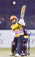 Shreyas Khanolkar of Mumbai Champs hits a six during the ICL Twenty20 tournament in Panchkula