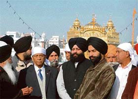 Sir Anerood Jugnath, President of the Republic of Mauritius, comes out after paying obeisance at the Golden Temple in Amritsar