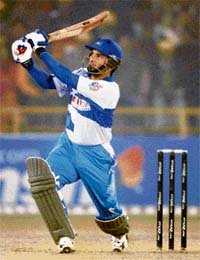 Abbas Ali of Delhi Jets plays a shot against Chandigarh Lions during the semifinal of the ICL Twenty20 tournament at the Tau Devi Lal Stadium in Panchkula