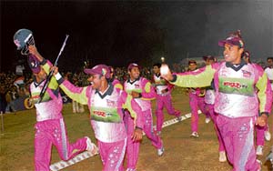 Victorious Chennai Superstars players doing a victory lap after winning the ICL Twenty20 Cup at Panchkula on Sunday.