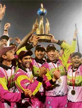 Jubilant Chennai Superstars players with the trophy they bagged after defeating Chandigarh Lions in the final of the ICL Twenty20 tournament at the Tau Devi Lal Stadium at Panchkula on Sunday.