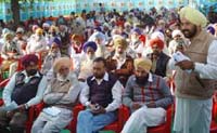 People from the villages attending the NREGA camp in Bathinda on Monday.