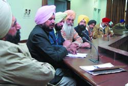 Members of the Agni Kand Insaf Dewao Action Committee at a meeting in Bathinda on Tuesday.
