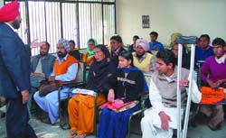 Harpal Singh, Deputy Director (Employment Generation and Training), addressing the physically challenged at a seminar organised at the District Employment Office in Bathinda on Tuesday.