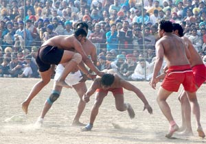 Players in action during a kabaddi match on the concluding day of the four-day sports festival at village Mehraj on Wednesday.