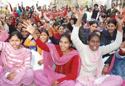 ITI students raising anti-police slogans outside the mini-secretariat in Bathinda on Monday.