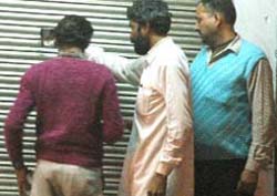 People buying liquor at midnight in Bathinda.