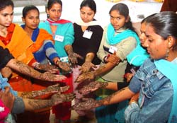 Participants at the NSS camp showing henna designs after a �mehandi competition� held at SSD Girls College in Bathinda on Monday.