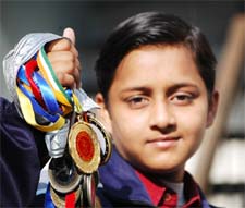 A Proud collection: Suxam Singla showing her medals in Bathinda on Wednesday.�