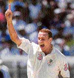 Stuart Clark celebrates on taking the wicket of Yuvraj Singh.