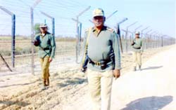 BSF men patrolling along the India-Pakistan border on Friday. 