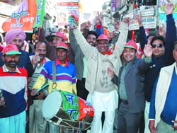 The BJP supporters in Bathinda celebrating their party�s victory in Himachal Pradesh on Friday. The BJP secured a majority of the seats. 