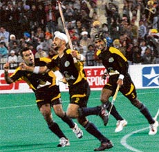 Sandeep Singh (C) of Chandigarh Dynamos celebrates after scoring a goal against Sher-e-Jalandhar during a PHL match on Friday.